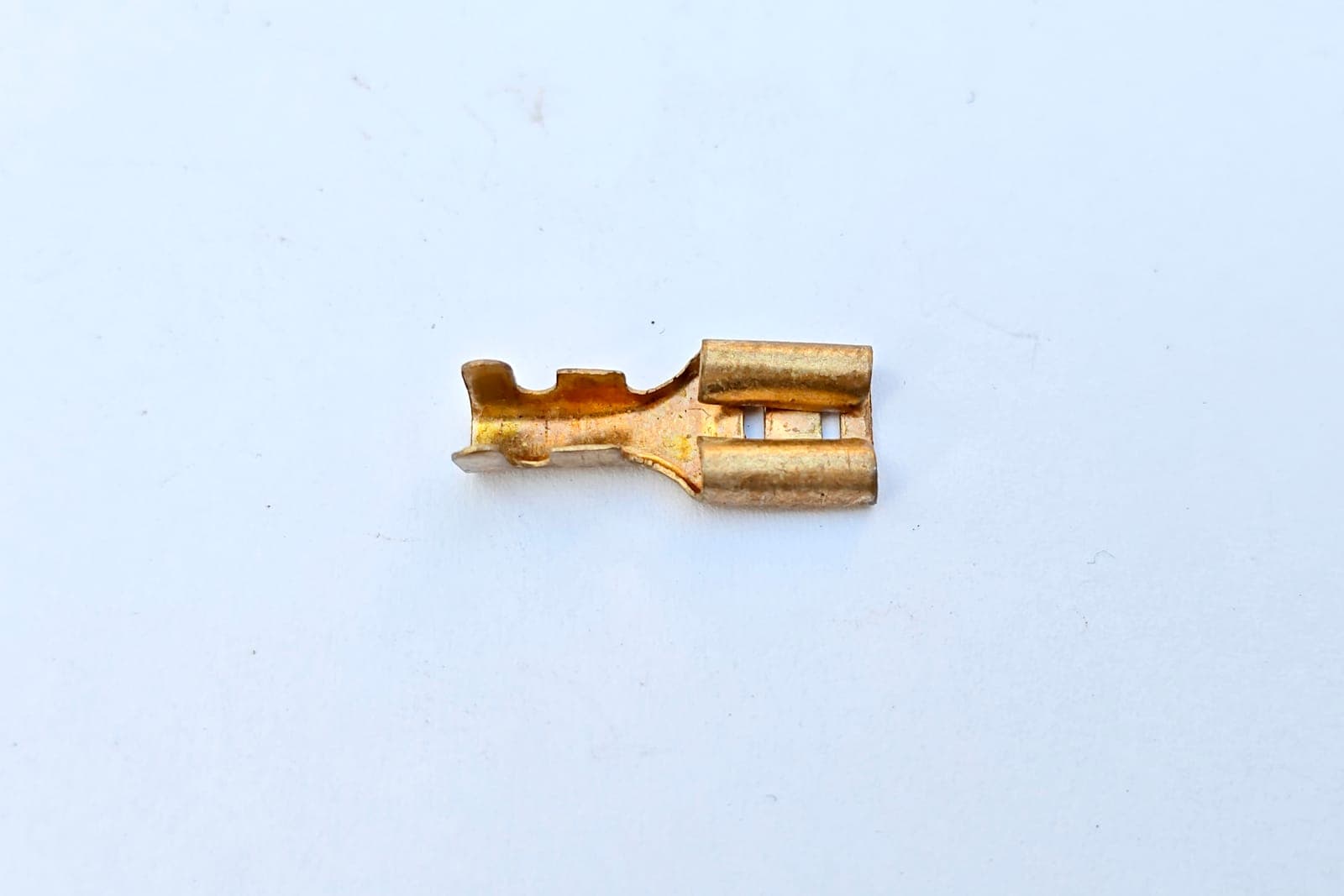 A Female Spade Connector, photographed for identification practice
